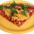Pizza whit vegan cheese and vegan sausage 
( einkorn flour, tomato paste, red pepper, vegan sausage, olives, vegan cheese )
